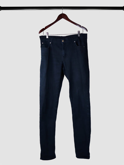 Black Denim Jeans on a hanger on a rack