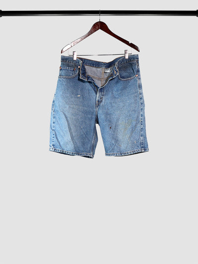 Vintage Levi's blue jean shorts on a hanger