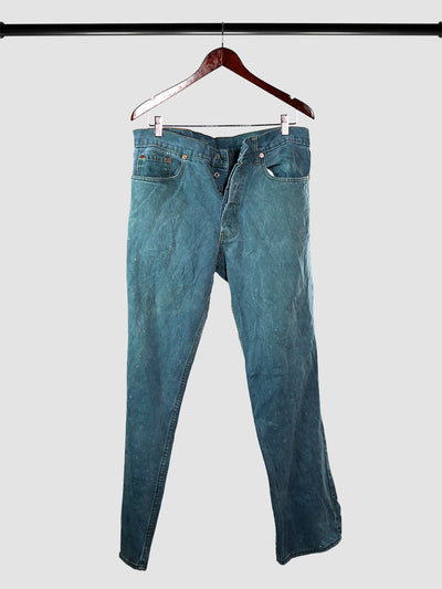 Vintage blue green 502 Levi's jeans on hanger for sale
